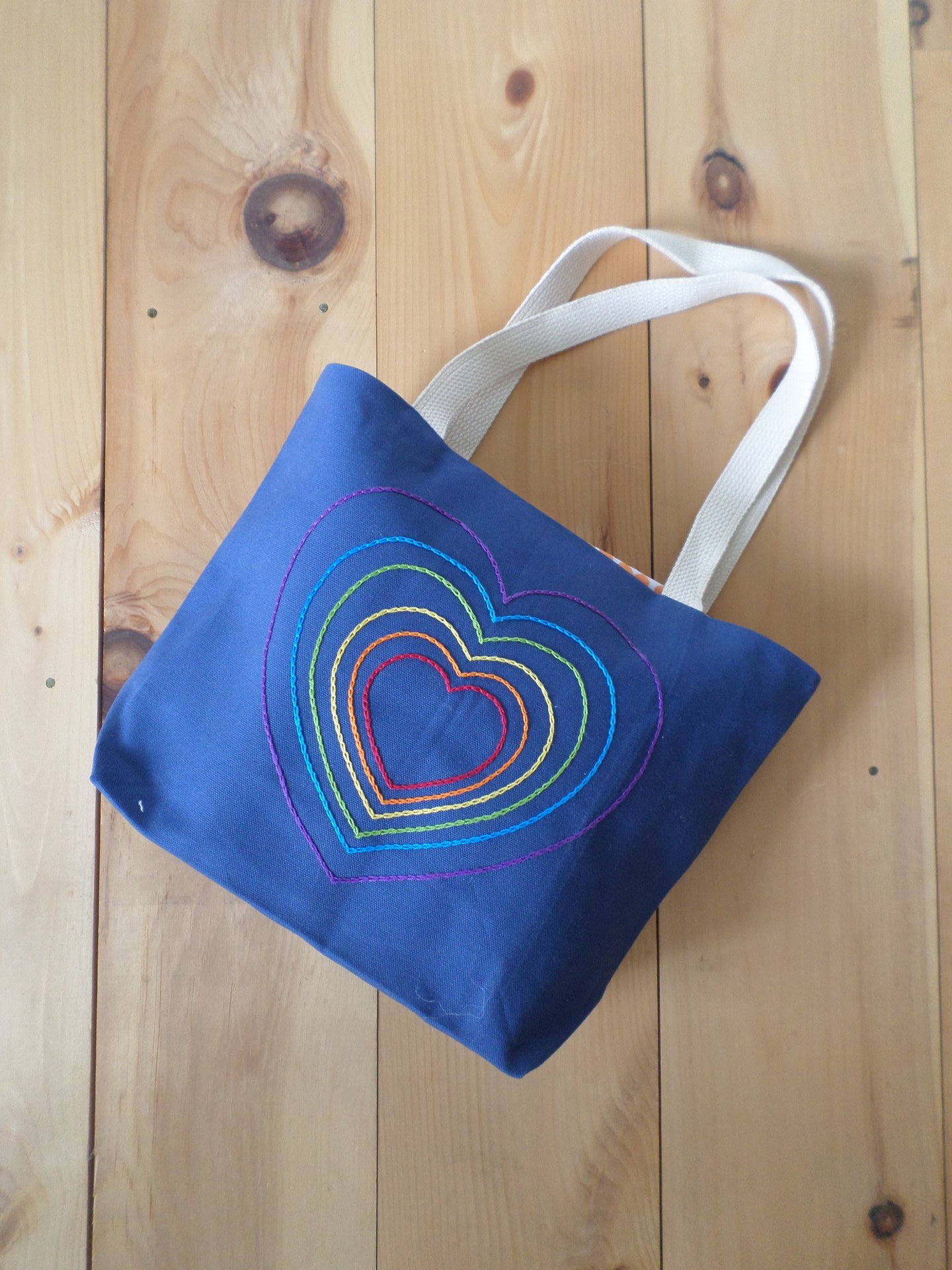 Hand embroidered store tote bag